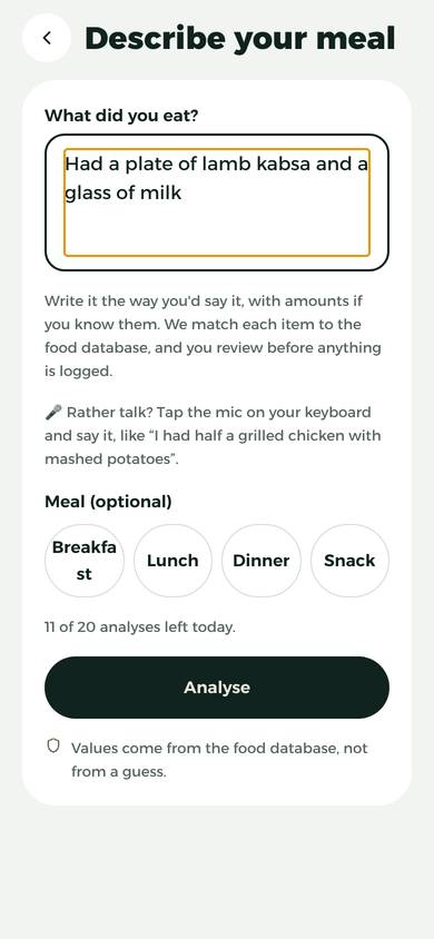 The “Describe your meal” screen with the text: Had a plate of lamb kabsa and a glass of milk.